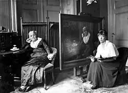 Wilhelmina Drucker sitting for her portrait for her seventieth birthday, 1917.