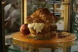 A German version, known as a Windbeutel