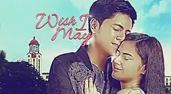 An image of Miguel Tanfelix and Bianca Umali leaning on each other, over a blue background with a building. The series title is displayed on the upper side of the image.