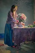 Woman arranging flowers, c. 1915. Asheville Art Museum
