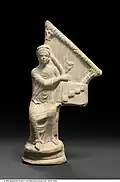 Terracotta figurine of a woman with a lyre, Egypt, 4th century A.D.