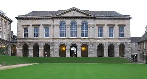 The main building rebuilt between 1720 and 1786. Above the arcade is the Old Library; behind the arcade are the main entrance to the College (centre) and the entrances to the Chapel (left) and the Hall (right)