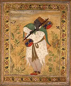 Ca. 1605. Portrait of Naubat Khan by Ustad Mansur, Mughal School ca. 1605, British Museum, London.[13] The instrument is depicted with two strings.