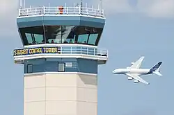 New air traffic control tower with A380 in background