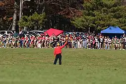 Image 20The start of a typical cross country race, as an official fires a gun to signal the start (from Cross country running)