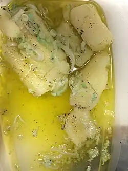 Marinated cassava (Spanish: Yuca en escabeche)