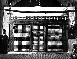 Now-destroyed zarih formerly covering the grave of his grave in the Mausoleum of Shia Imams