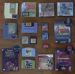 Photograph of various The Legend of Zelda game boxes, cartridges and discs.