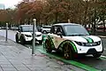 Two Tazzari Zeros charging at Avenue Louise, Brussels, Belgium