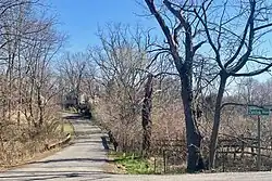 Headquarters House and grist mill in the distance, on Zentek Road