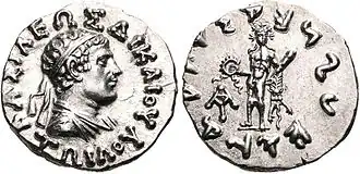 Silver coin of Zoilus I. Obverse shows the King wearing royal diadem, with Greek legend: ΒΑΣΙΛΕΩΣ ΔΙΚΑΙΟΥ ΖΩΙΛΟΥ, Basileōs Dikaiou Zōilou, "Of King Zoilus the Just". Reverse with standing Heracles, and Kharosthi legend: Maharajasa Dhramikasa Jhoilasa, "Of the Great King Zoilus, the Follower of the Dharma".