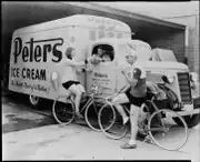 Advertisement for Peters Ice Cream from 1939 featuring Valda Unthank and Hubert Opperman.[7]