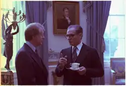 Photograph of United States President Jimmy Carter meeting with Iranian Shah Mohammad Reza Pahlavi at the White House on November 15, 1977