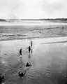 Local fishermen with fishing nets crossing Rio Pilcomayo 1908.